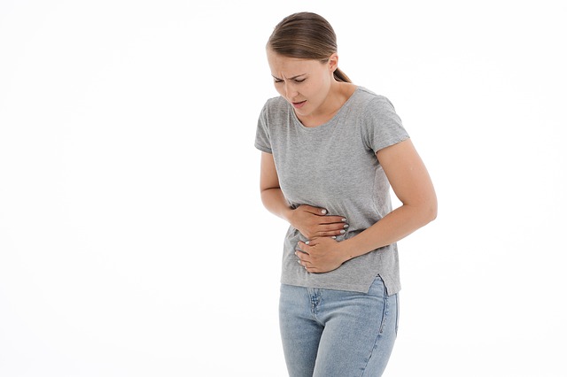 A woman suffering from stomach ache can be a gastric ulcer symptom, gastroenterologist in Brisbane